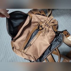 Brown 2 strapped backpack with tassel